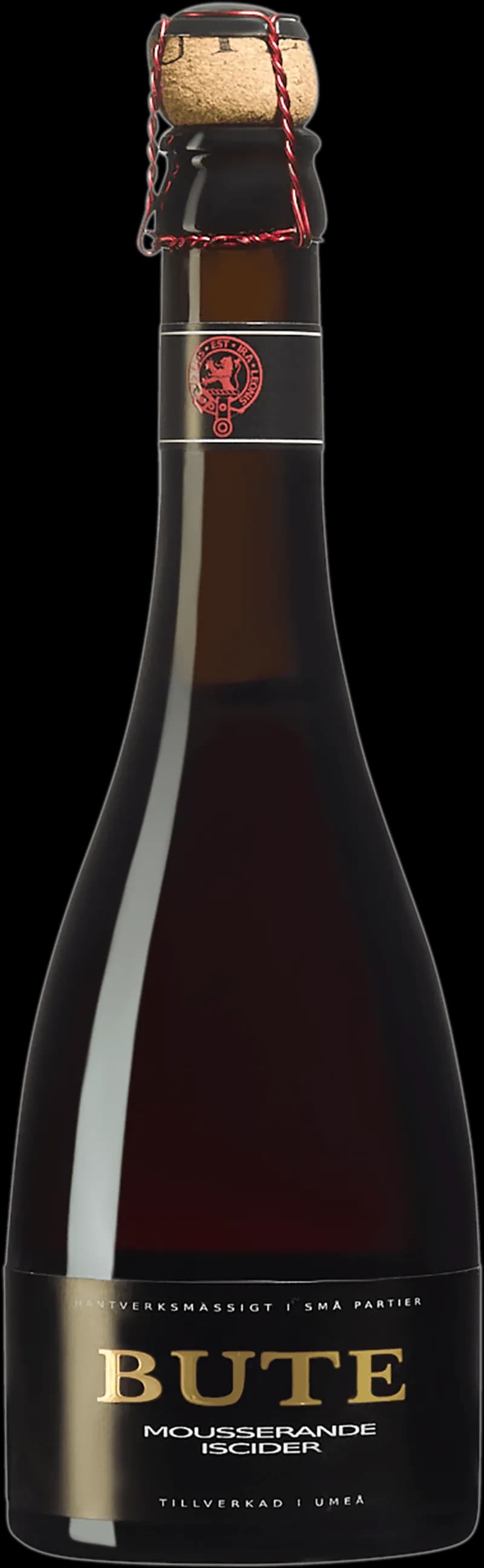 Flaska med bute smaksatt vin och fruktvin på ett bord.