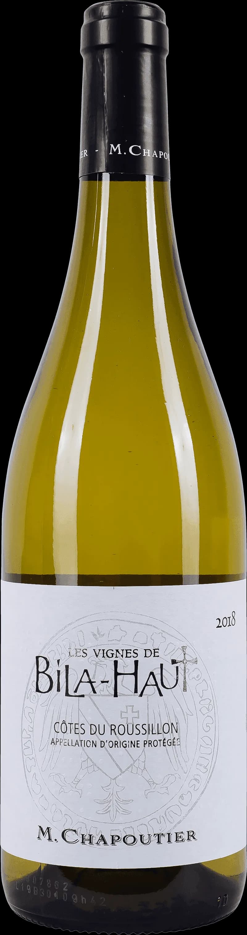 Flaska av Les Vignes de Bila-Haut Blanc, ett vitt vin från Languedoc, Frankrike.