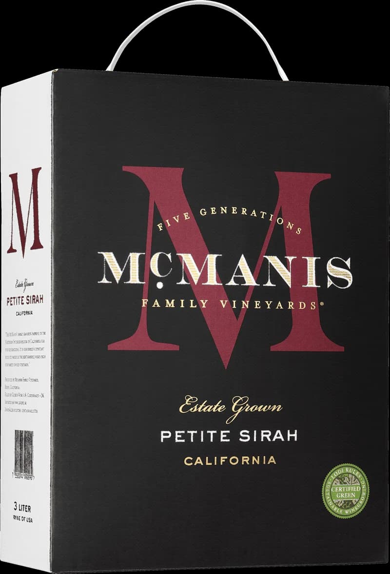Flaska med McManis rött vin mot mörk bakgrund